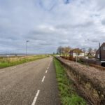 2-onder-1 kapwoning Den Bommel Beneden Oostdijk 66 straatbeeld